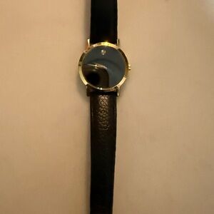 Movado Gold and Black Timepiece